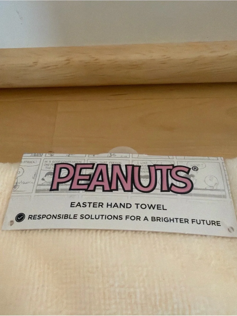 Peanuts Easter Cream Hand Towel with Pink Logo Accent